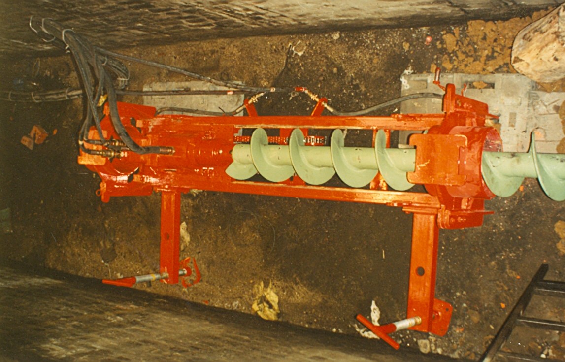 View of the machine performing a drilling in an excavation
